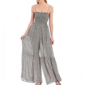 NWT  Free peopleBlack and White floral jumpsuit medium! Can be worn strapless.